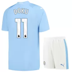 Günstige Manchester City Doku 11 Kindertrikot Heim 2023/24 Kurzarm Günstige Manchester City Doku 11 Kindertrikot Heim 2023/24 Kurzarm